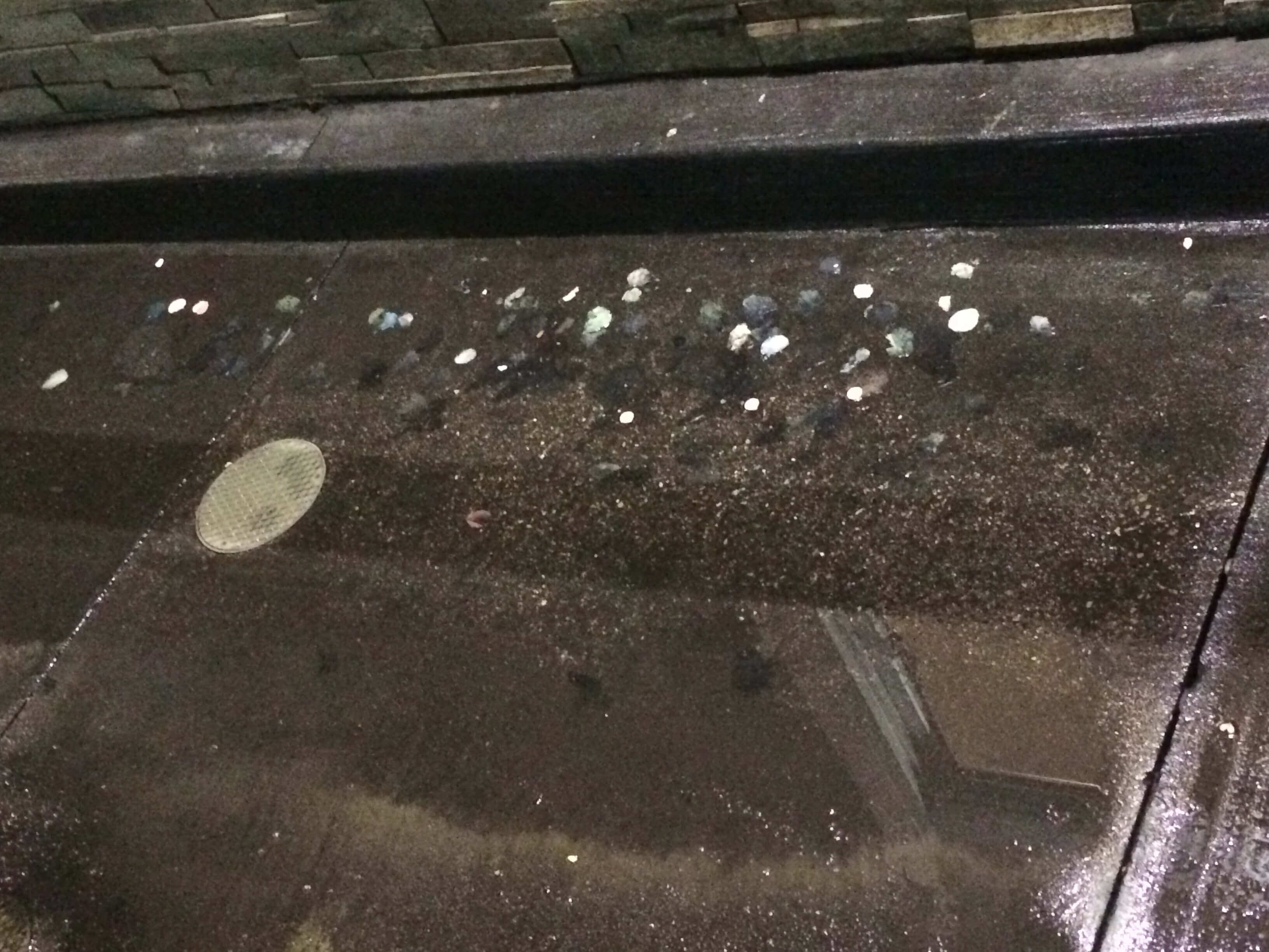 High-quality post-pressure washing results on heavily soiled gas station fuel pads.