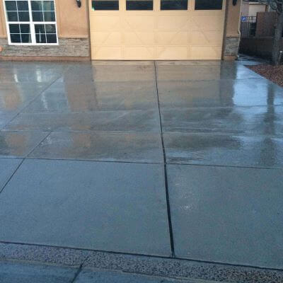 Cleaned concrete driveway after professional pressure washing
