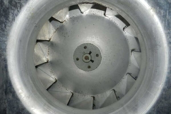 Clean commercial kitchen exhaust fan after professional hood cleaning and exhaust fan degreasing service